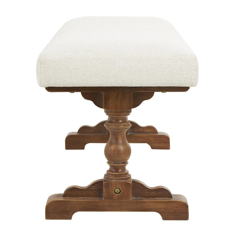 Banco tapizado color crema con patas torneadas marrones